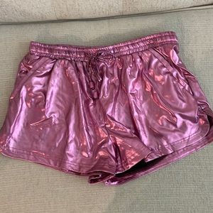 Shiny pink shorts